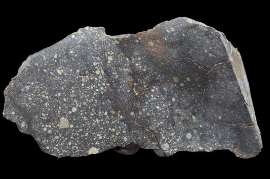 NWA 12858 R3 meteorite main mass from Buy Meteorite LLC, dark metallic stone with rough, uneven surface and natural mineral texture.
