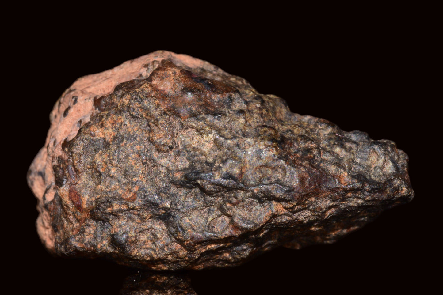 Rare NWA 13272 ungrouped meteorite fragment, natural achondrite specimen, 11.6 g, showcasing unique extraterrestrial surface features.