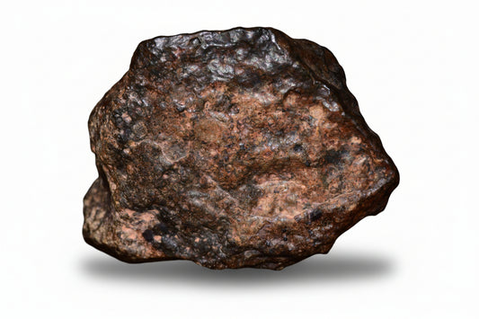 Natural fragment of NWA 13272 ungrouped achondrite meteorite, 10.7g, showing rugged surface and metallic details.