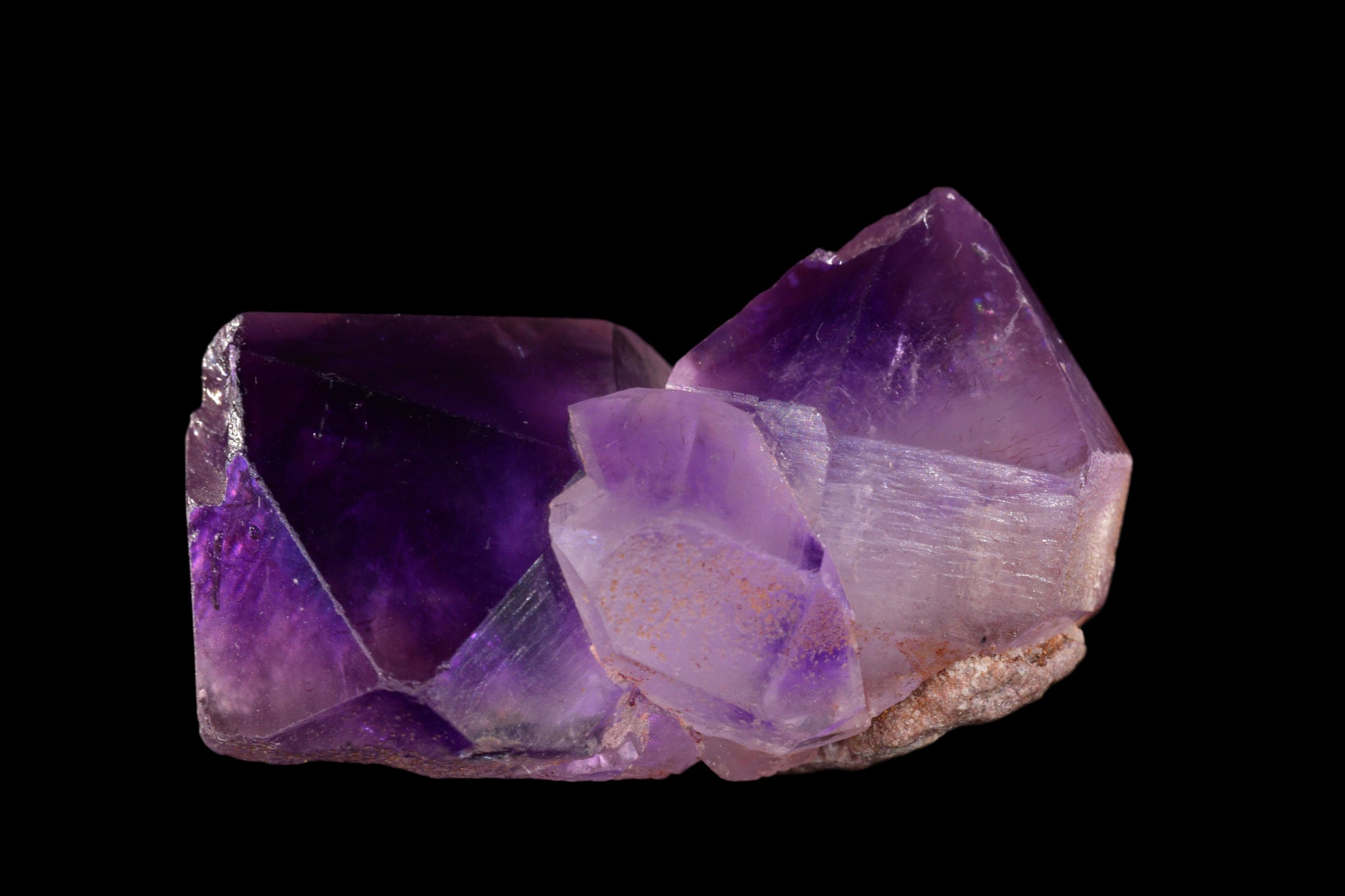 Vivid purple Amethyst Morocco crystal from Buy Meteorite LLC, showcasing its natural crystalline structure and deep violet color.