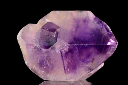 Amethyst Morocco crystal from Buy Meteorite LLC showing vibrant purple hues and natural mineral formations.