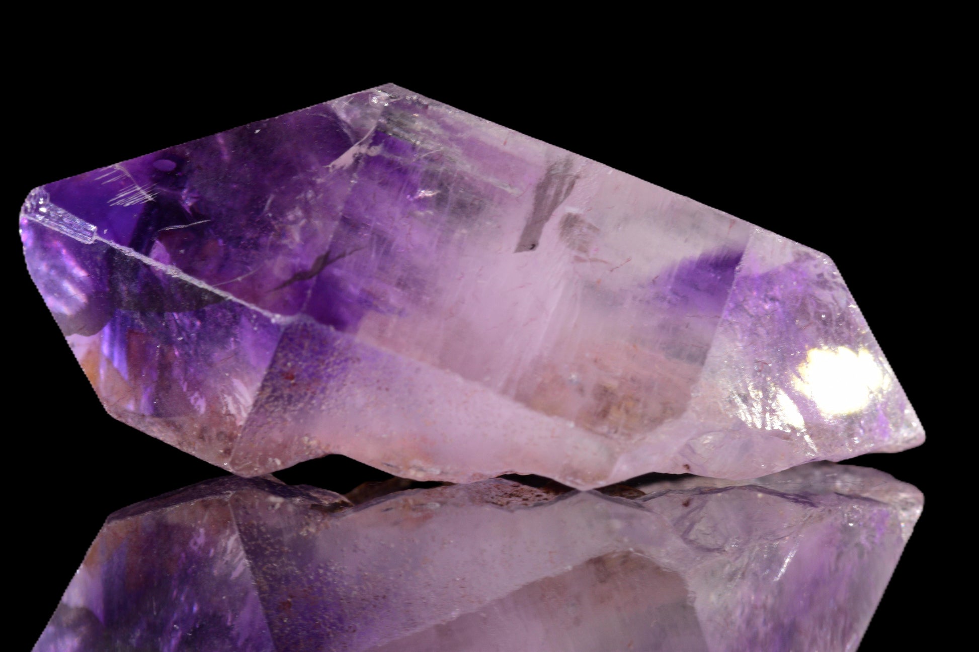 Polished Amethyst Morocco crystal from Buy Meteorite LLC, showcasing deep purple hues and natural crystalline formations.