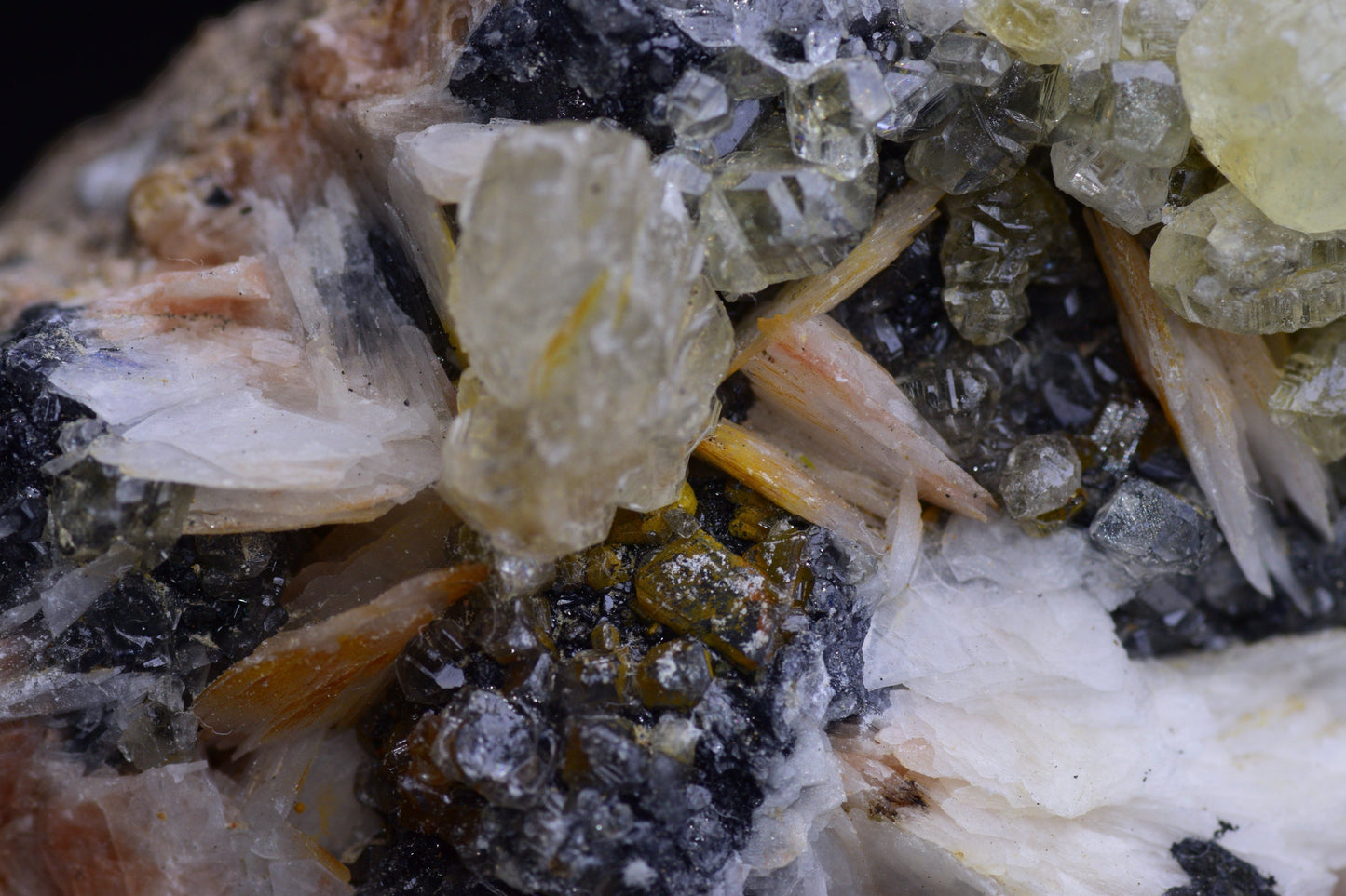 Crystalline Cerussite on barite mineral specimen from Mibladen district, Morocco, showcasing translucent white and blue mineral formations.