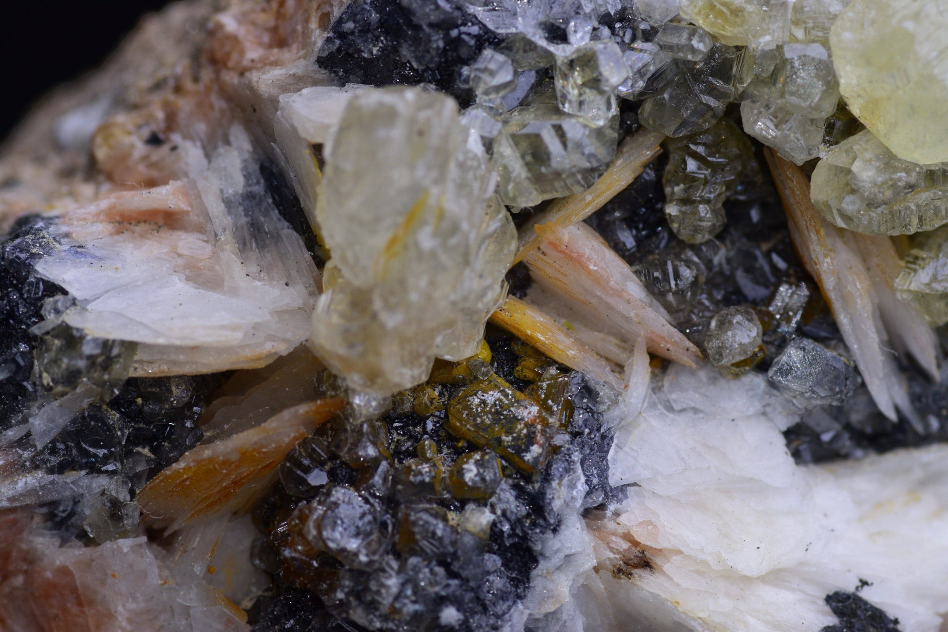Cerussite crystals on barite mineral specimen from Mibladen district, Morocco, featuring transparent and white crystalline formations.