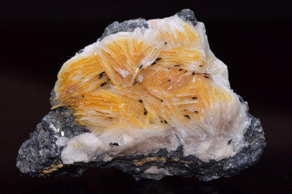 Crystallized Cerussite on Barite from Mibladen district, Morocco, showcasing mineral formations and vibrant mineral colors.