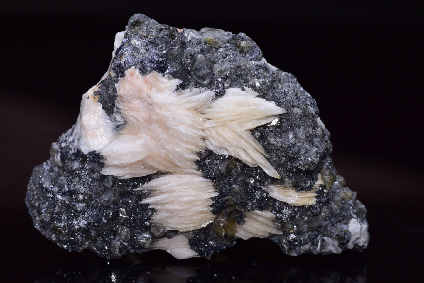 Cerussite crystal on barite mineral specimen from Mibladen district in Morocco, showcasing light-colored crystal formations.