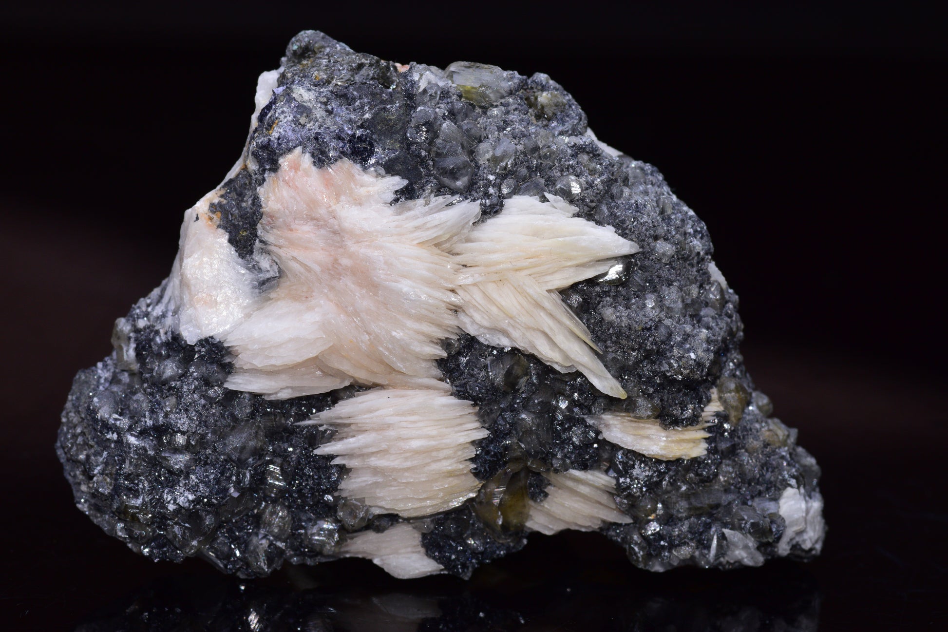 Cerussite crystal on barite mineral specimen from Mibladen district in Morocco, showcasing light-colored crystal formations.