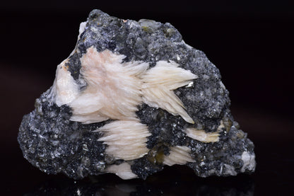 Cerussite crystal on barite mineral specimen from Mibladen district in Morocco, showcasing light-colored crystal formations.