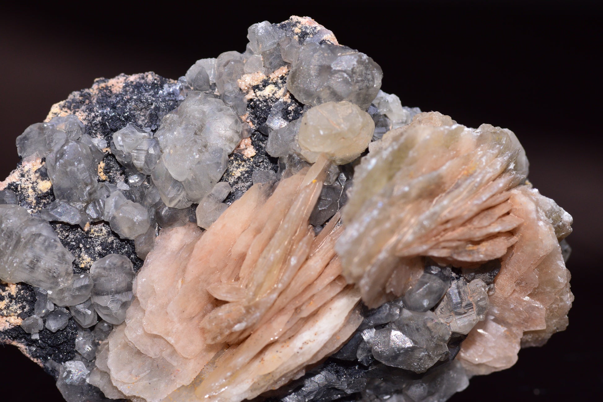 Cerussite mineral on barite crystal from Mibladen district Morocco, featuring clear and vibrant mineral formations.