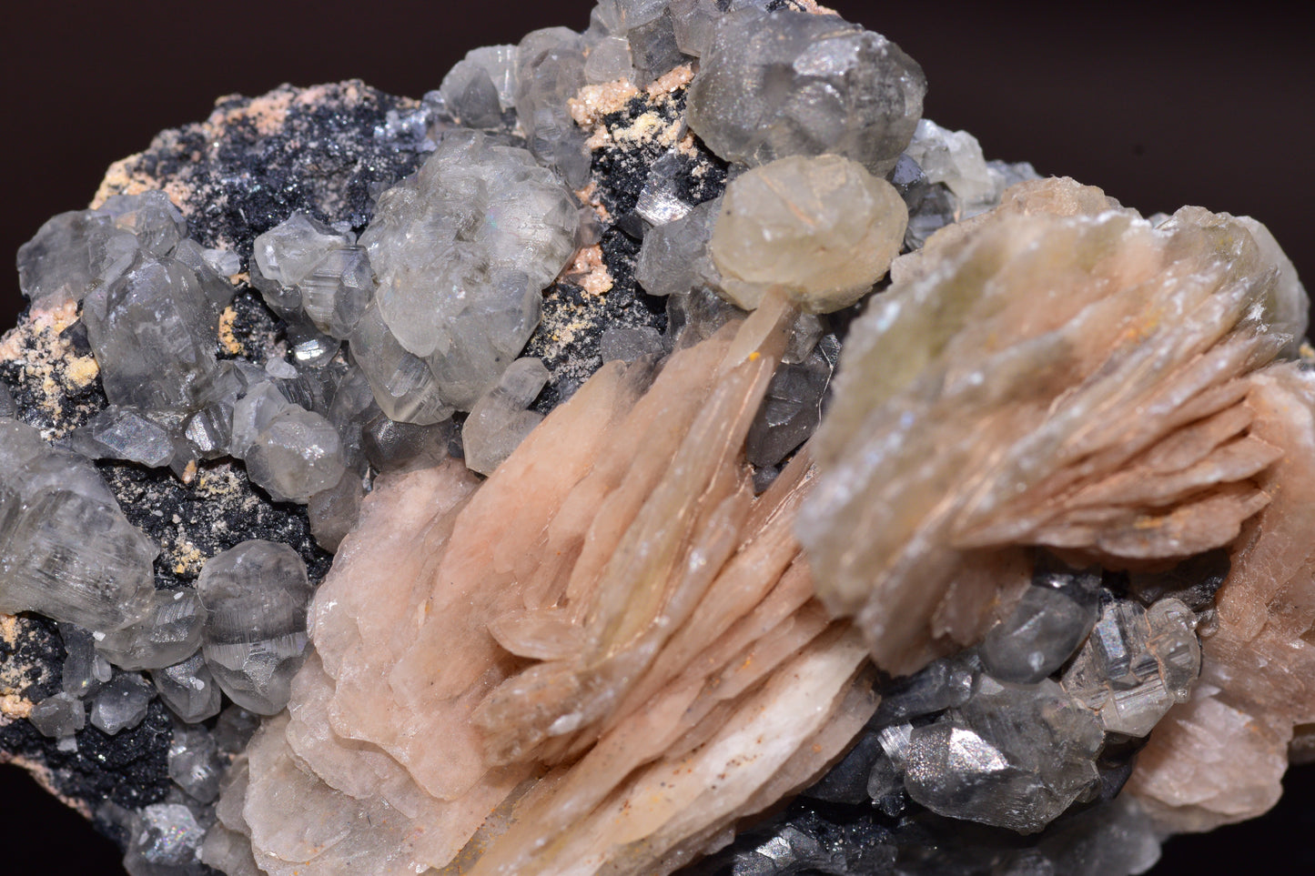 Pink cerussite crystal on white barite from Mibladen district Morocco, displayed on a mineral specimen.