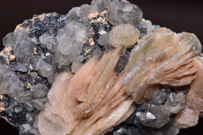Pink cerussite crystal on white barite from Mibladen district Morocco, displayed on a mineral specimen.