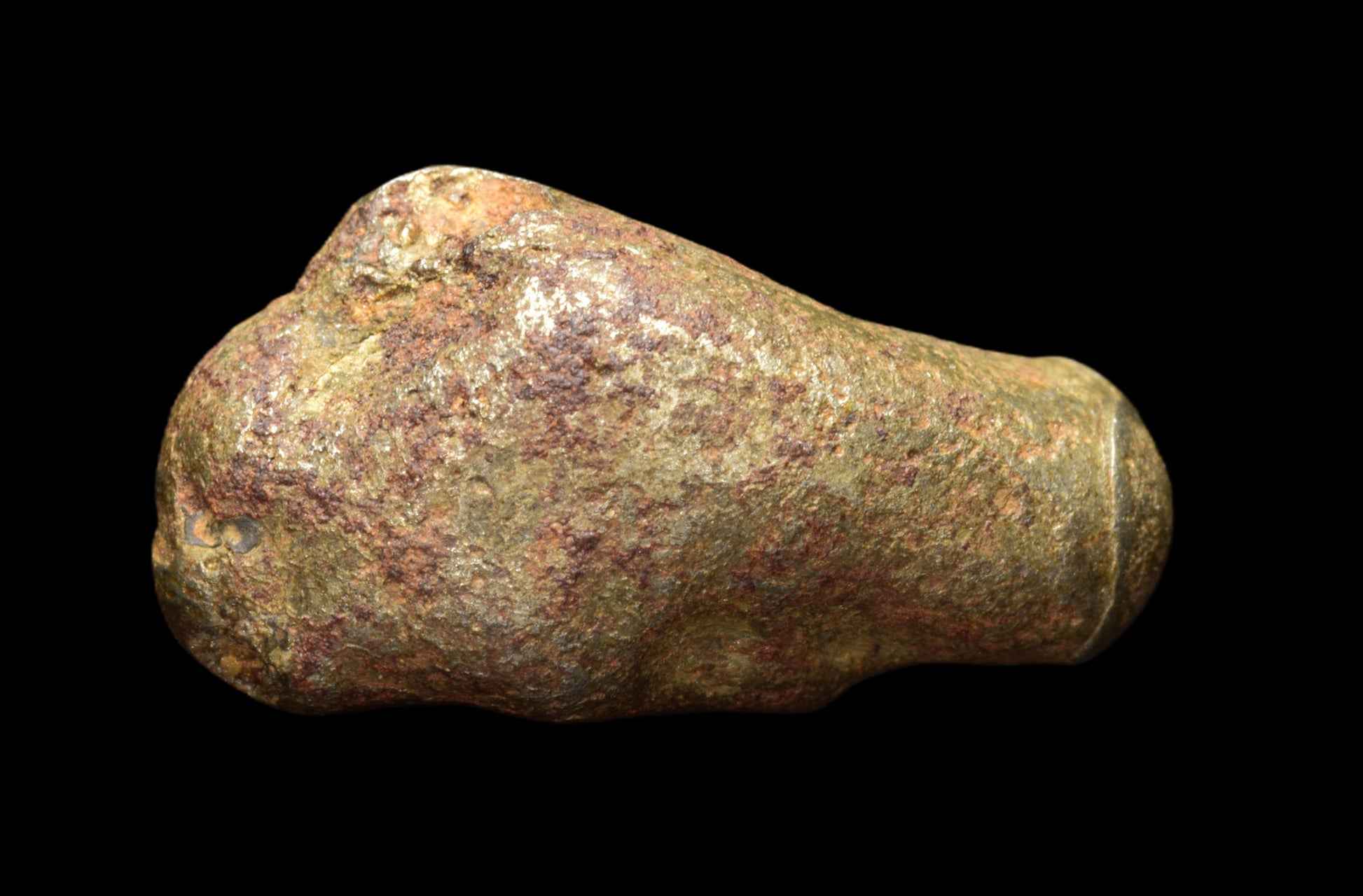 Golden Pallasite meteorite weighing 4.41 grams, showcasing its metallic and crystalline structure, from Buy Meteorite, LLC.