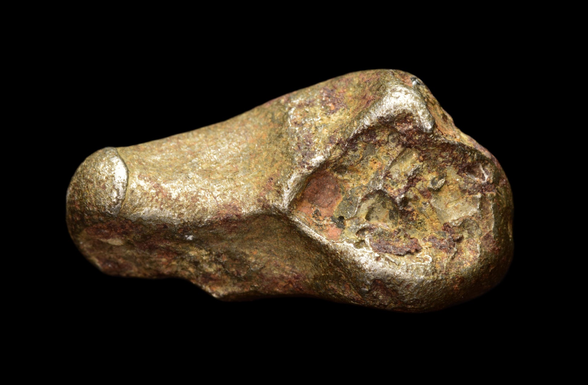 Golden Pallasite meteorite weighing 4.41 grams, featuring striking crystalline textures and vibrant golden hues.