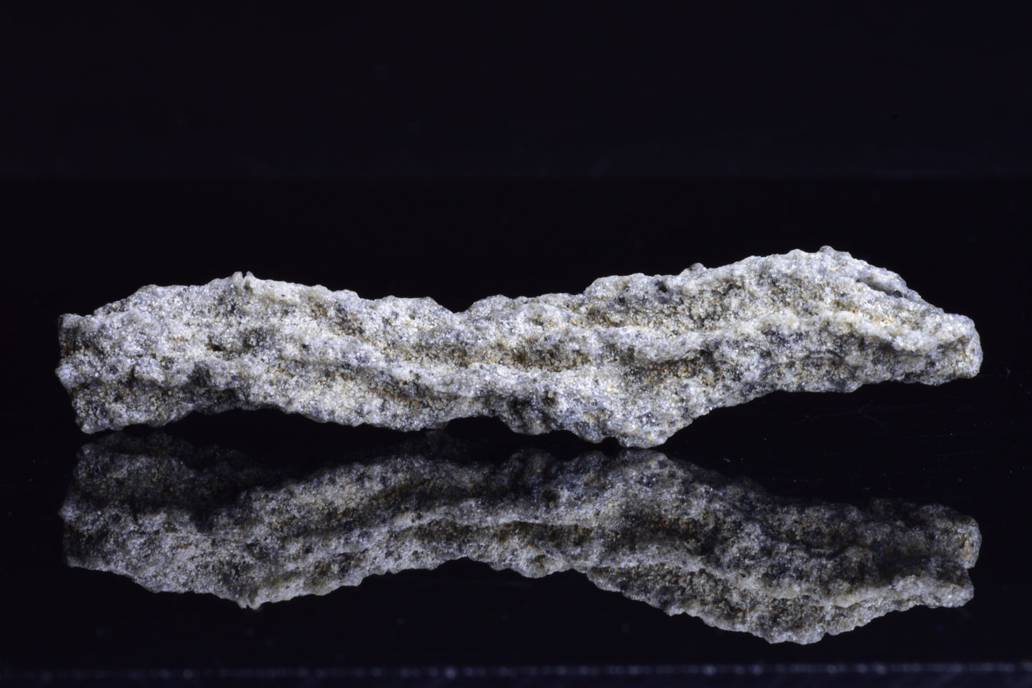 Fulgurite lightning fused glass crystal from Buy Meteorite LLC, showcasing a natural glass formation with intricate lightning patterns.