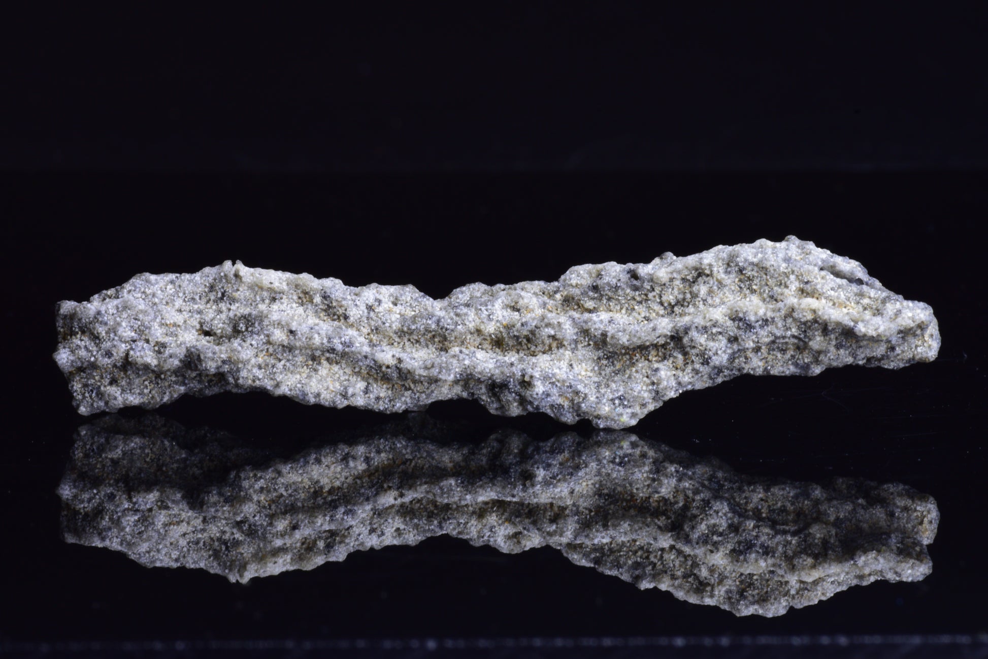 Fulgurite lightning fused glass crystal from Buy Meteorite LLC, showcasing a natural glass formation with intricate lightning patterns.