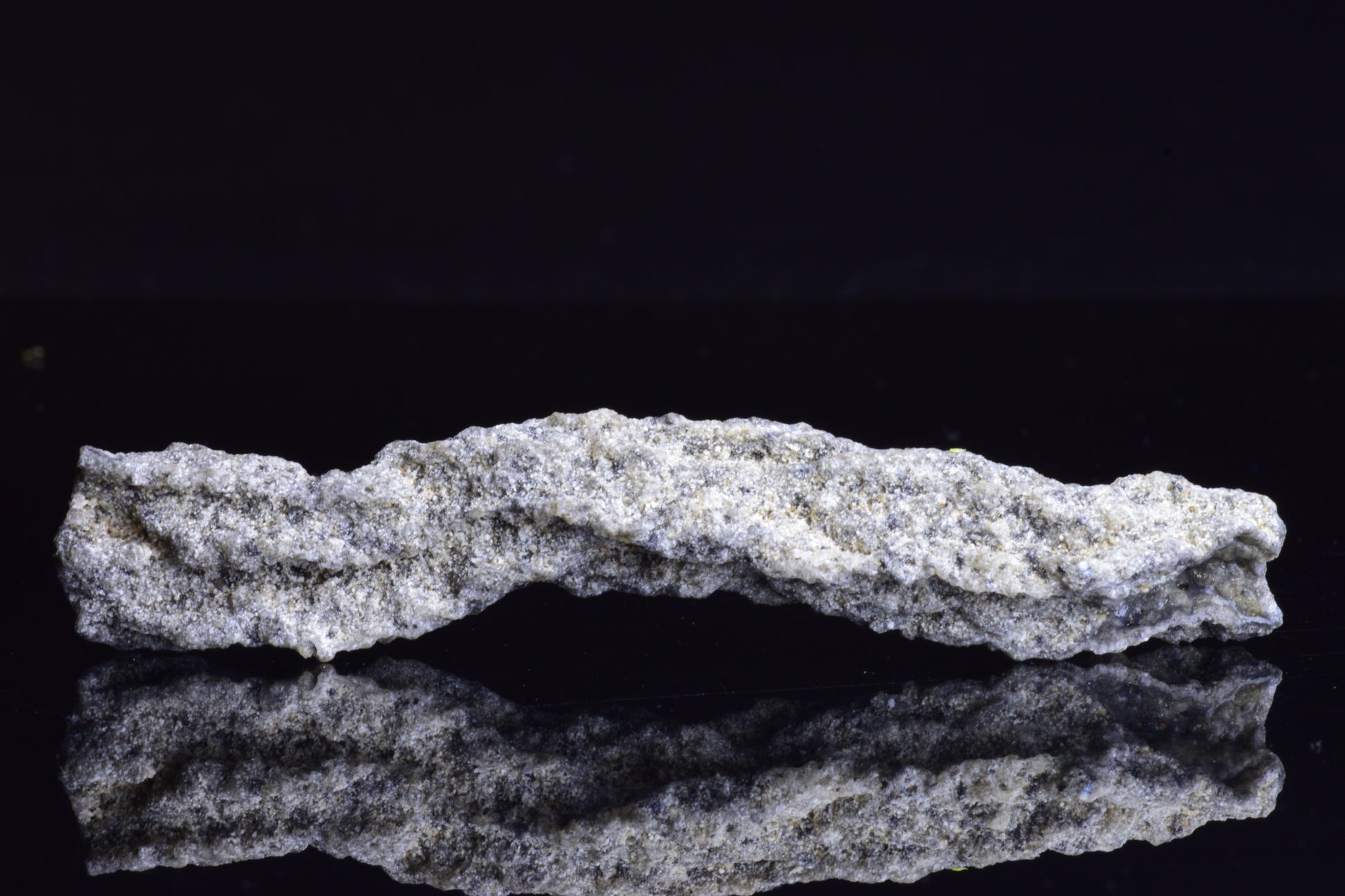 Fulgurite lightning fused glass crystal weighing 6.4 grams, showcasing natural glass formation with vibrant lightning patterns.