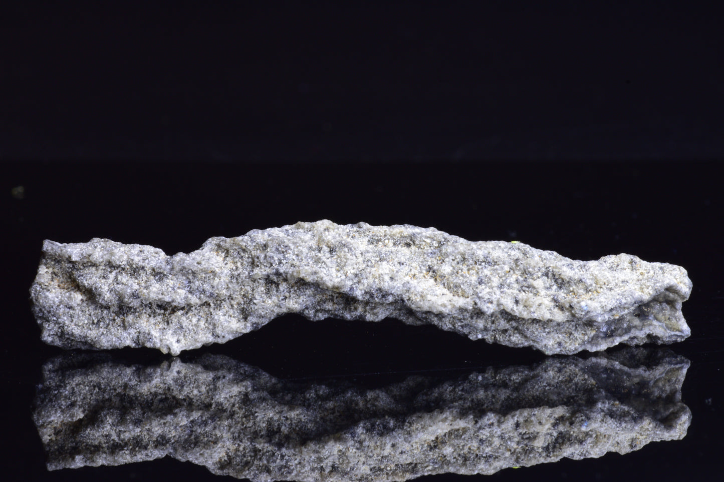 Fulgurite lightning fused glass crystal weighing 6.4 grams, showcasing natural lightning strike patterns and vibrant glass textures.