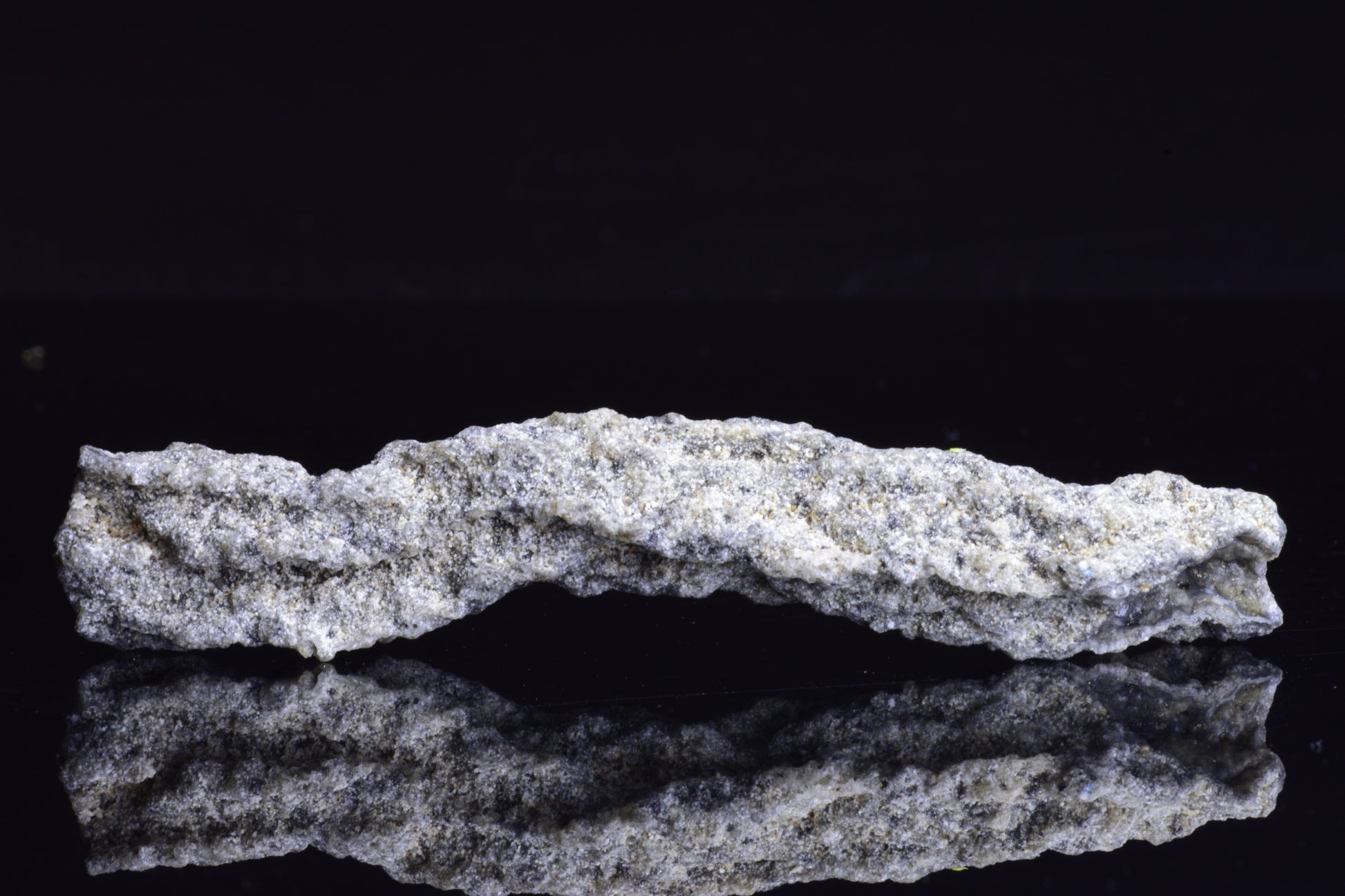 Fulgurite lightning fused glass crystal weighing 6.4 grams, showcasing natural lightning strike patterns and vibrant glass textures.