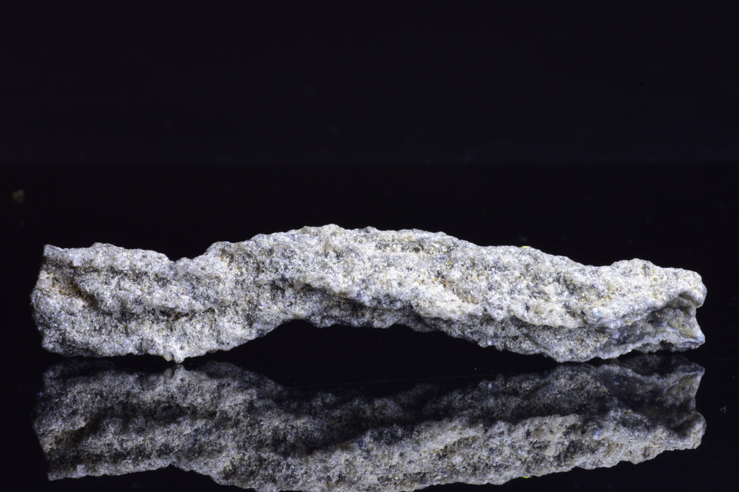 Fulgurite Lightning Fused Glass crystal weighing 6.4 grams, showcasing natural glass formation with vibrant lightning-like patterns.