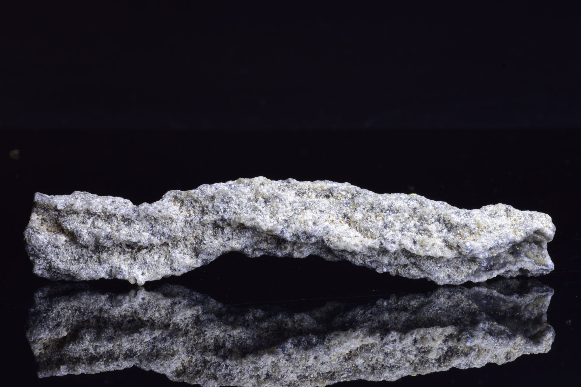 Fulgurite Lightning Fused Glass crystal weighing 6.4 grams, showcasing natural glass formation with vibrant lightning-like patterns.