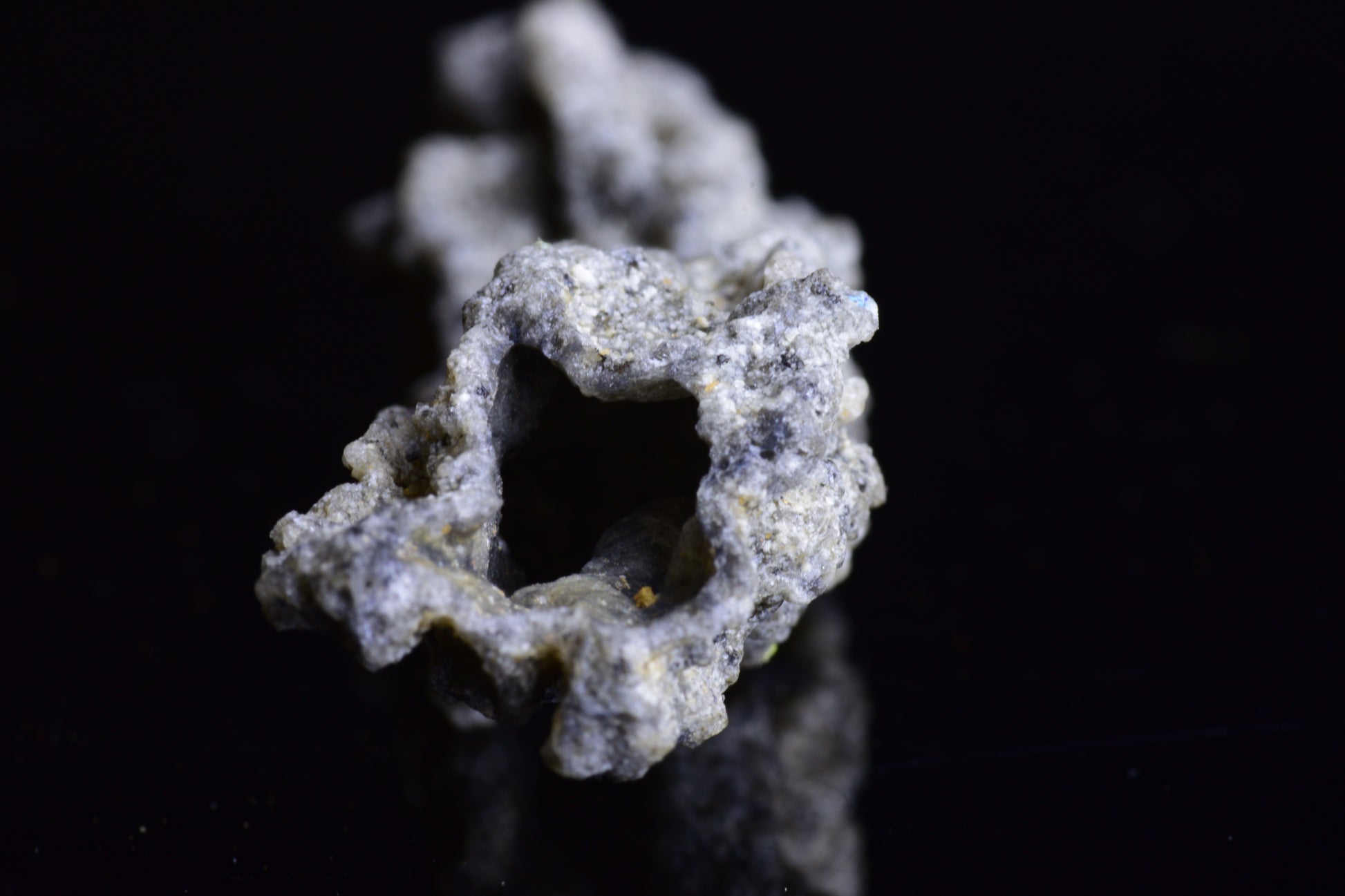 Fulgurite Lightning Fused Glass crystal weighing 6.4 grams, showcasing a unique lightning-fused glass formation by Buy Meteorite LLC.