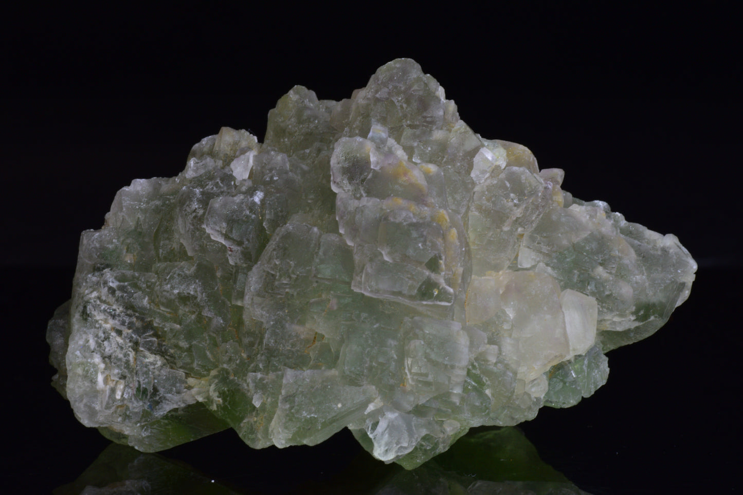 Green fluorite crystal from El Hammam Morocco, showcasing vibrant green hues and natural mineral formations.