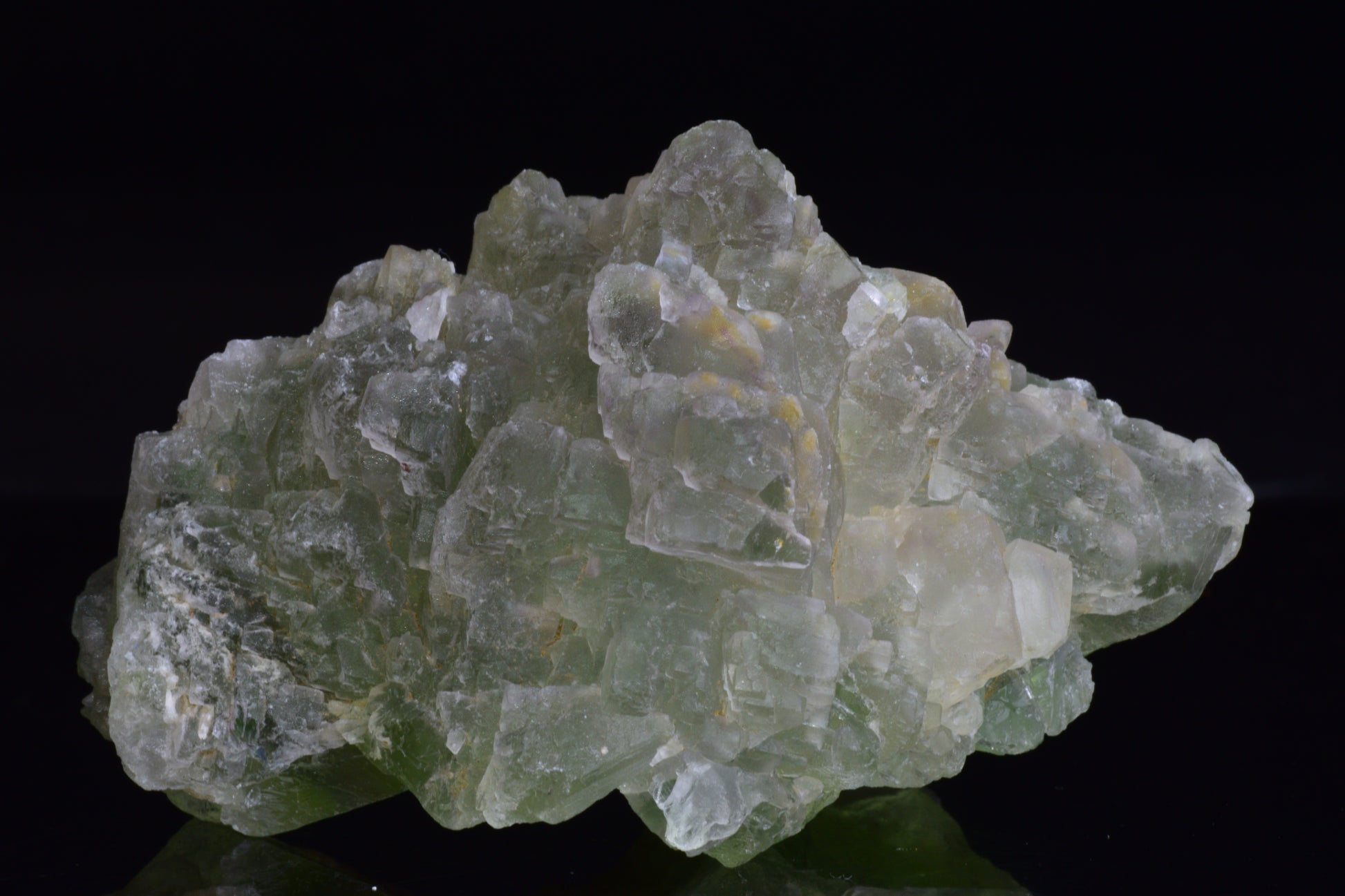 Green fluorite crystal from El Hammam, Morocco, showcasing vibrant green hues and natural mineral formations.