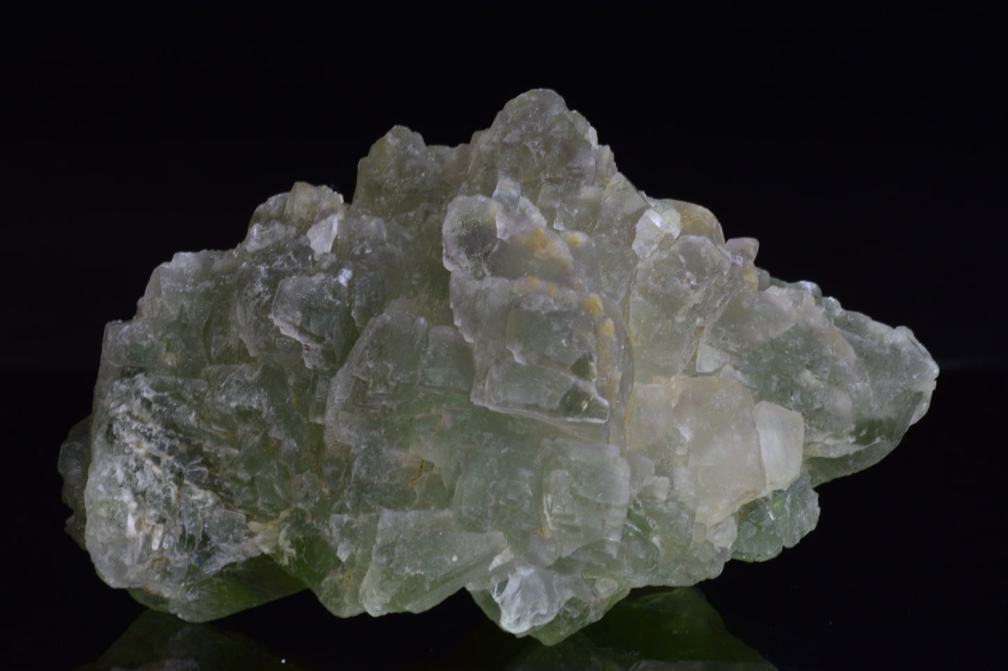 Green Fluorite crystal from El Hammam, Morocco, featuring vibrant green hues and natural crystal formations.