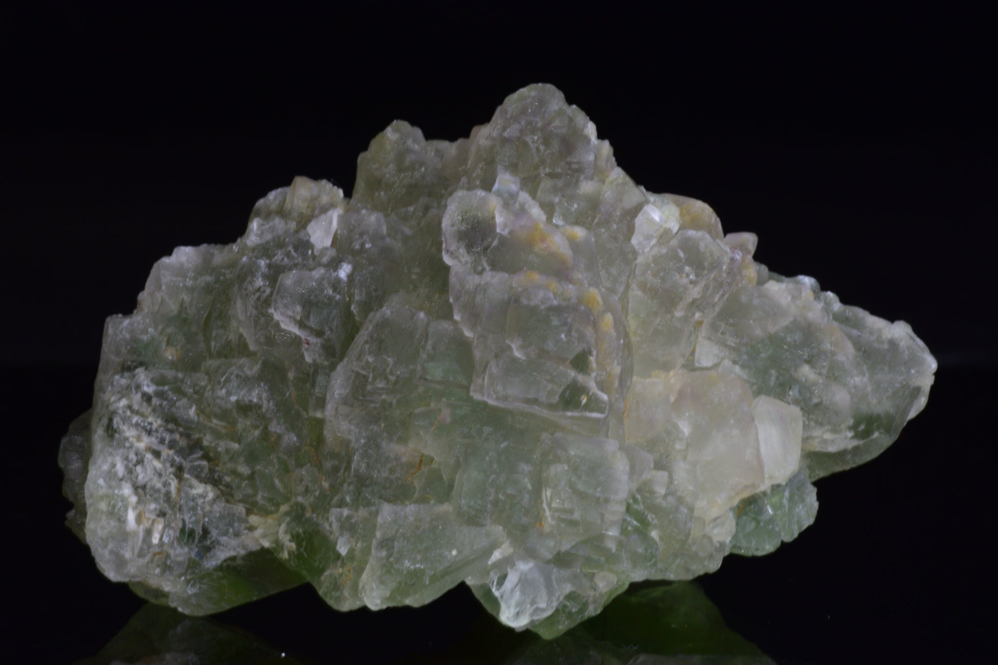 Green fluorite crystal from El Hammam Morocco, showcasing vibrant green hues and natural mineral formations.