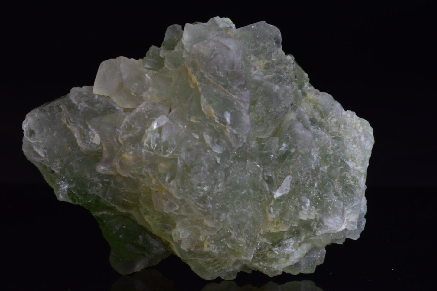 Green Fluorite crystal from El Hammam, Morocco, showcasing vibrant green hues and natural crystalline structure.