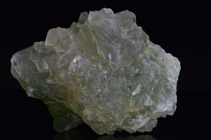 Green Fluorite crystal from El Hammam, Morocco, showcasing vibrant green hues and natural crystalline structure.
