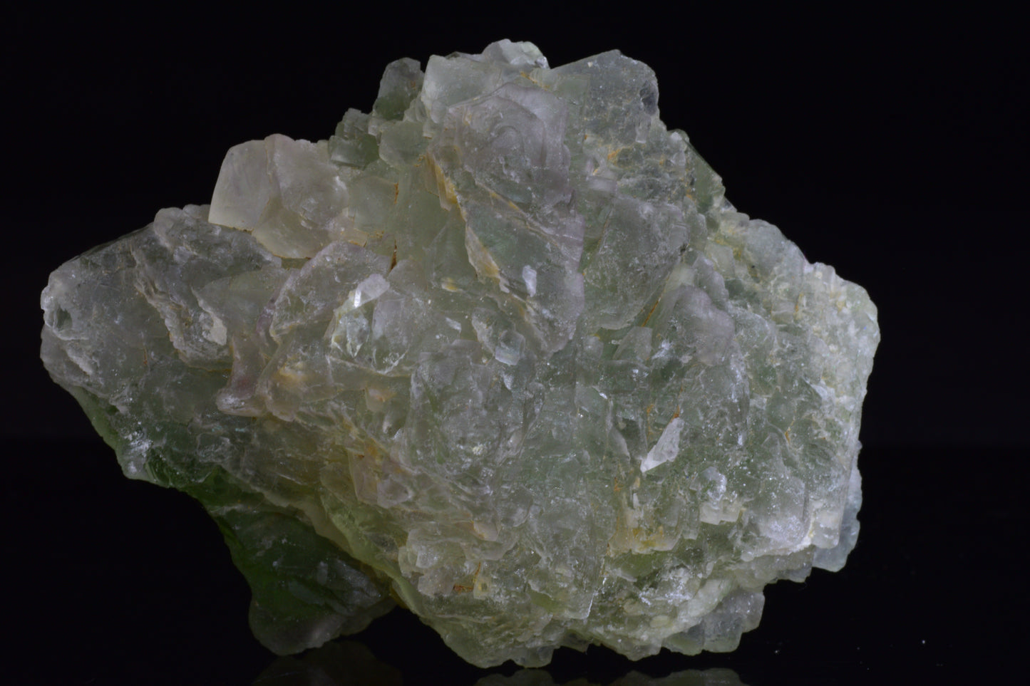 Green fluorite crystal from El Hammam Morocco, showing vibrant translucent green hues and natural crystal formations.