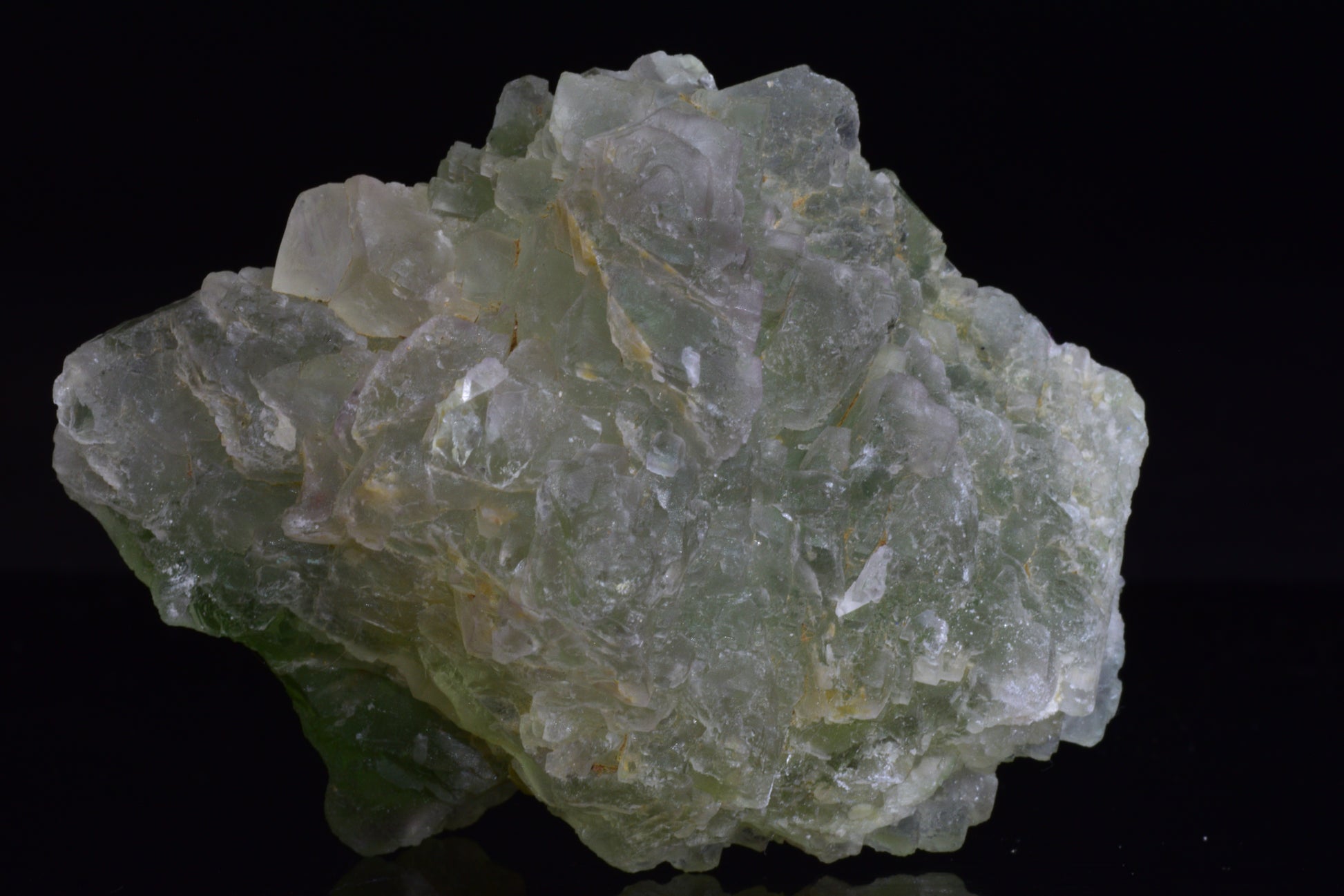 Green fluorite crystal from El Hammam Morocco, showing vibrant translucent green hues and natural crystal formations.