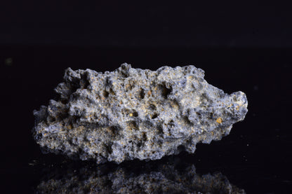 Fulgurite lightning-fused glass crystal from Sahara Desert, weighing 9.4 grams, displayed on a neutral background.