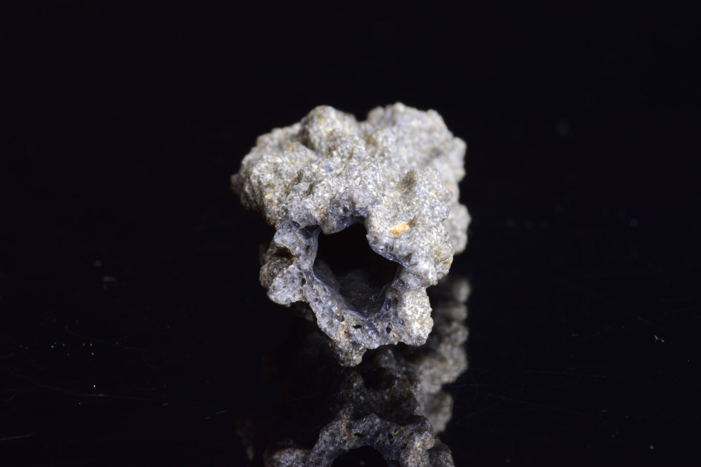 Fulgurite lightning-fused glass crystal from Sahara Desert, weighs 4.9 grams, showcasing natural lightning strike formation.
