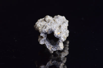 Fulgurite lightning-fused glass crystal from Sahara Desert, weighs 4.9 grams, showcasing natural lightning strike formation.