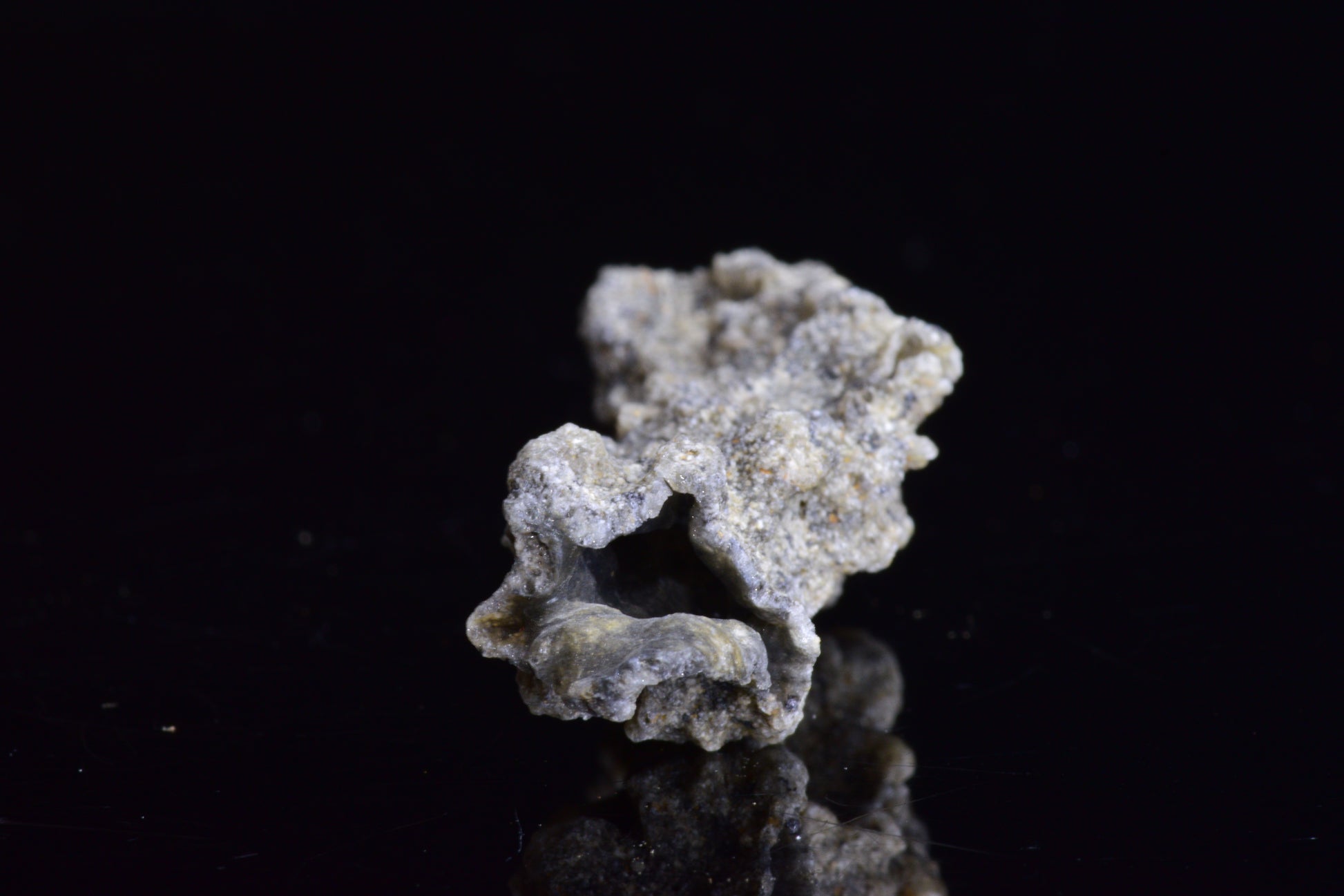 Fulgurite lightning fused glass crystal from Sahara Desert, weighing 2.9 grams, showcasing natural lightning strike formation.