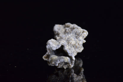 Fulgurite lightning fused glass crystal from Sahara Desert, weighing 2.9 grams, showcasing natural lightning strike formation.