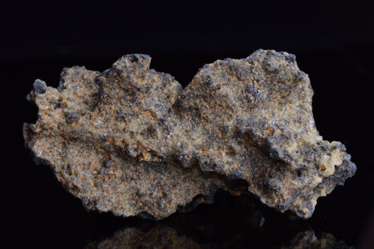 Fulgurite lightning fused glass crystal from Sahara Desert, created by Buy Meteorite LLC, weighing 6.9 grams, with a unique jagged appearance.