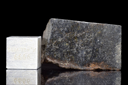 Close-up of NWA 11757 Ureilite meteorite from Buy Meteorite, LLC, showing its dark, rocky surface and unique mineral textures.