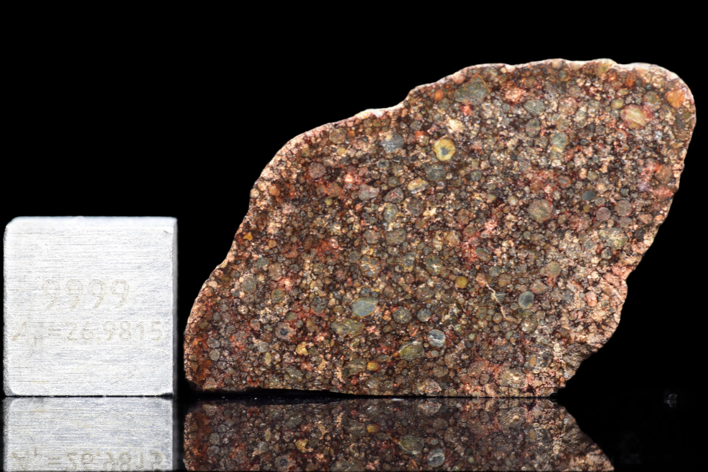NWA 12341 L3 meteorite, 3.7 grams, showing its dark fusion crust and interior structure, from Buy Meteorite, LLC.