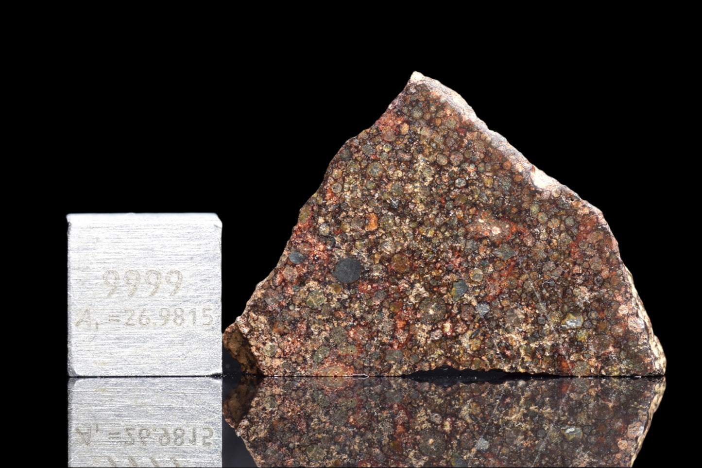 NWA 12341 L3 meteorite from Buy Meteorite, LLC, showing a 2.9g chondrite with a dark, rocky exterior and mineral textures.
