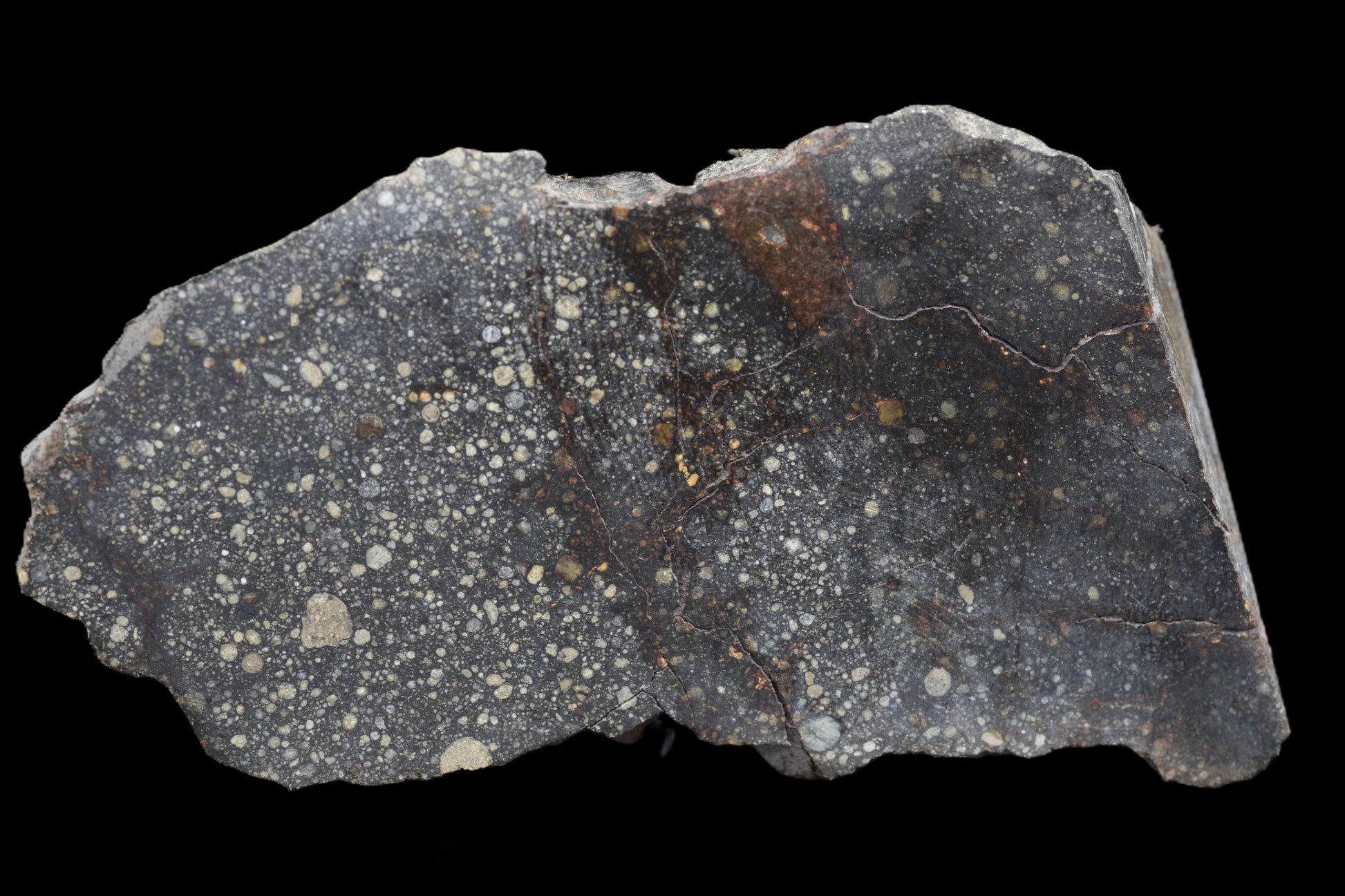 NWA 12858 R3 meteorite main mass, 119.7 grams, dark fusion crust and rocky interior, from Buy Meteorite LLC.