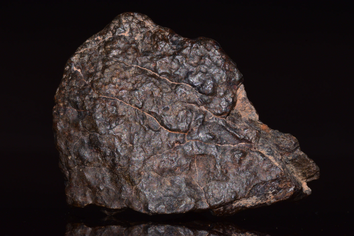 Natural fragment of NWA 13272 ungrouped achondrite meteorite, 17.7g, showcasing its rocky, textured surface.