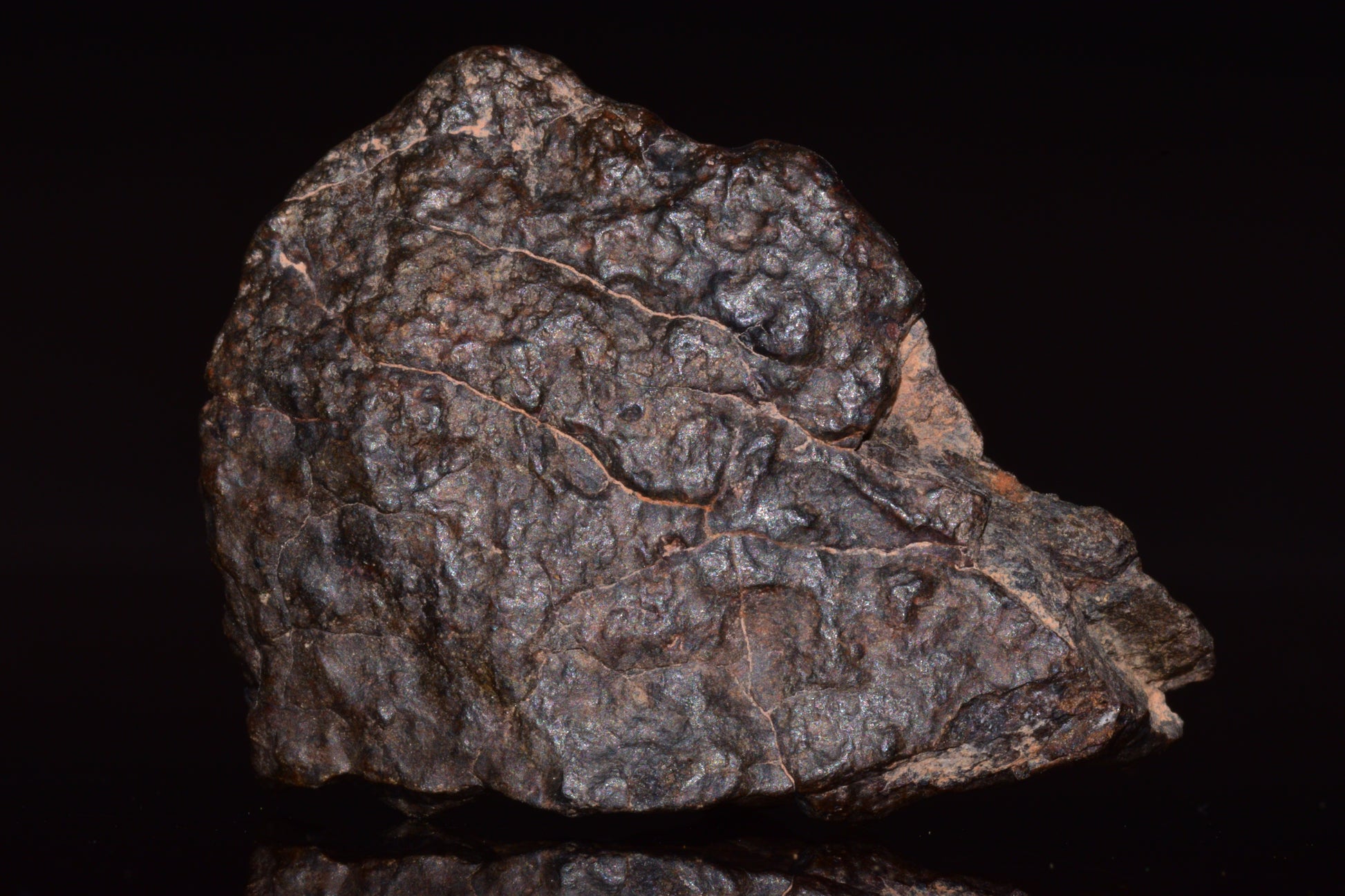 Natural fragment of NWA 13272 ungrouped achondrite meteorite, 17.7g, showcasing its rocky, textured surface.