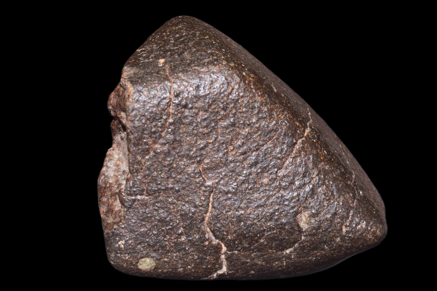 NWA 14003 H4 ordinary chondrite meteorite weighing 626.9 g, displayed with rough, dark surface and irregular shape.