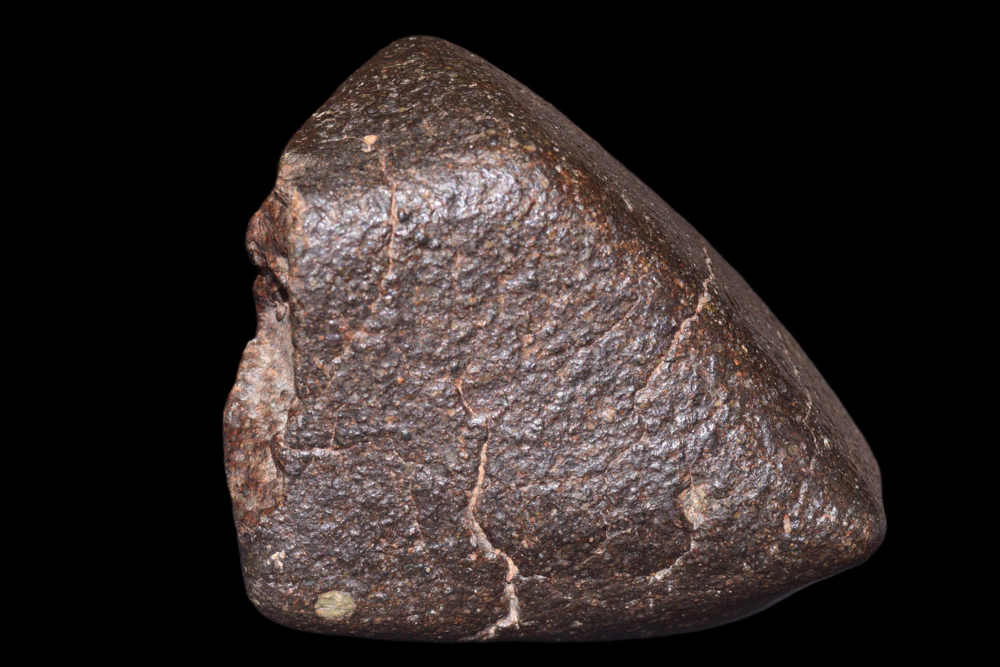 NWA 14003 H4 ordinary chondrite meteorite weighing 626.9 g, displayed with rough, dark surface and irregular shape.