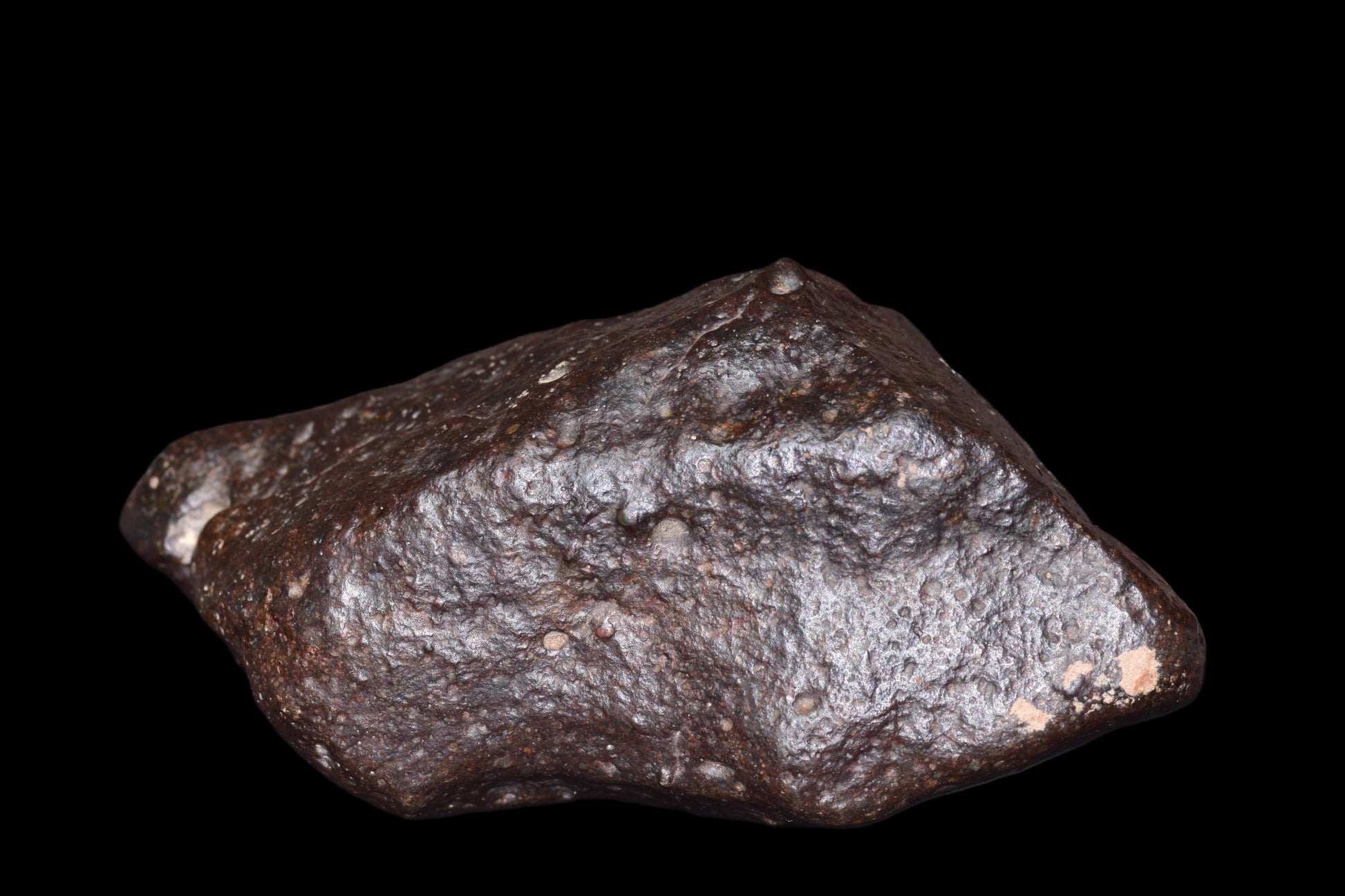 NWA 14003 H4 ordinary chondrite meteorite weighing 229.9 g, dark rocky surface with rough texture and mineral inclusions.