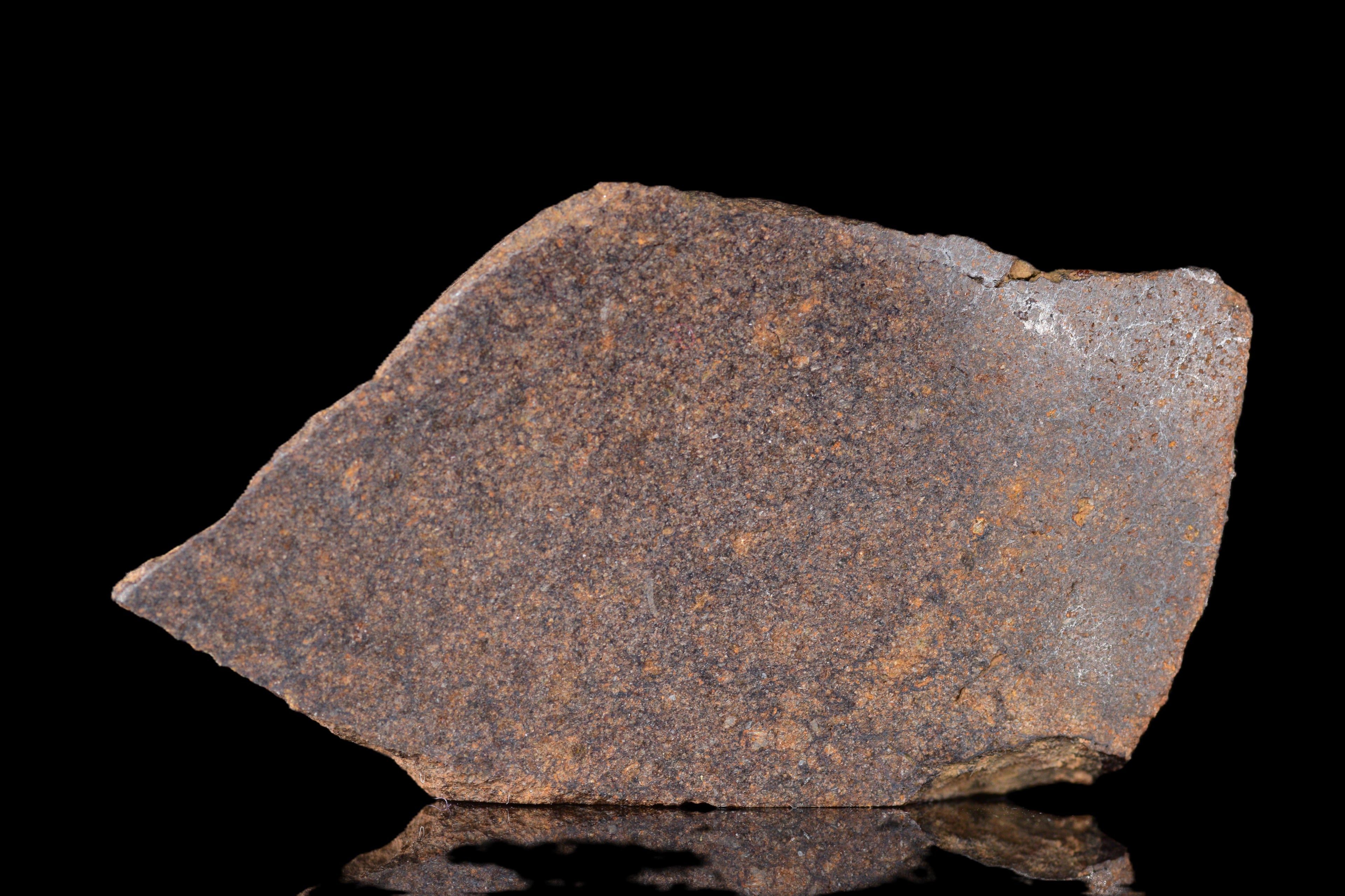 NWA 14235 EL-Melt rock 9.89 G