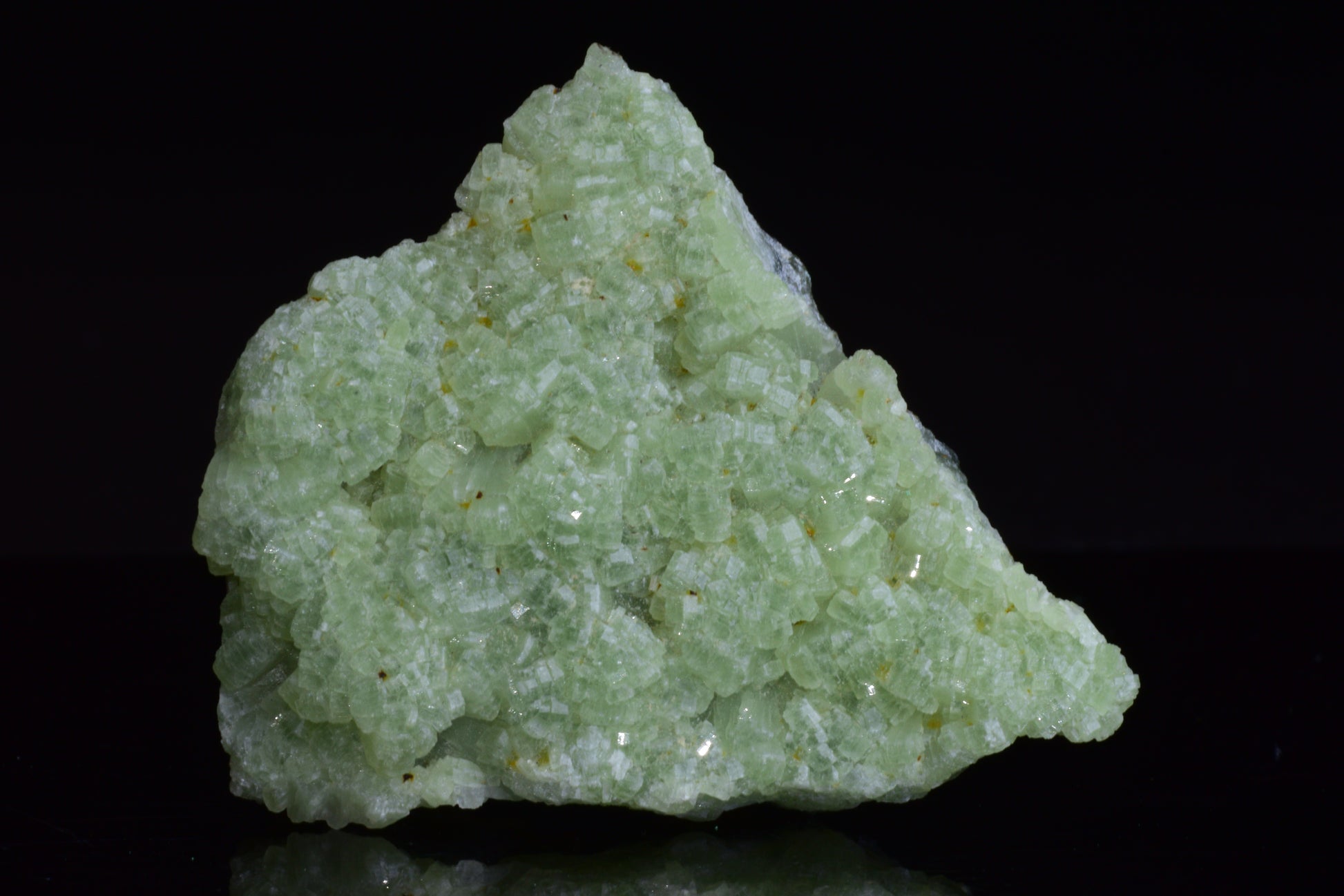 Prehnite and actinolite crystal from Boulemane, Morocco, showcasing green mineral formations with natural textures.